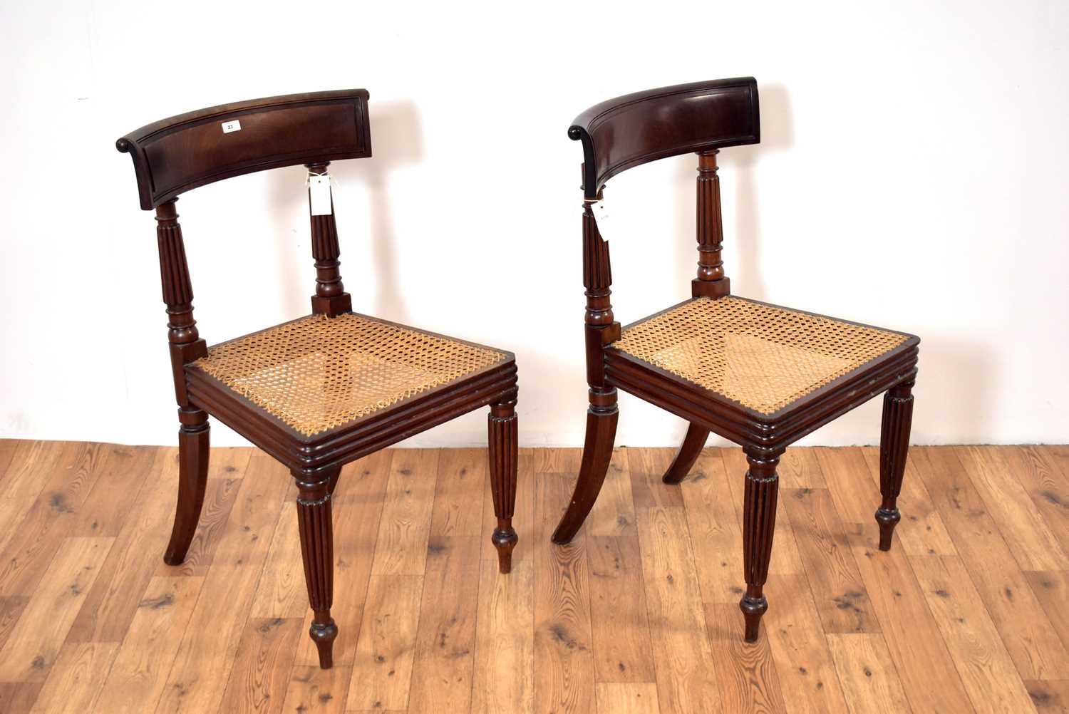 Lot 23 - A pair of 19th Century mahogany bar back dining chairs in the manner of Gillows