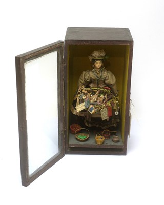Lot 758 - A 19th Century peddler doll