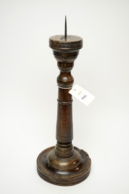 Lot 245 - A 17th Century stained oak pricket candlestick