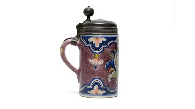Lot 927 - An 18th-century German faience pewter lidded tankard