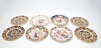 Lot 296 - A set of four Royal Crown Derby ‘Old Imari’ pattern circular plates; together with four other plates