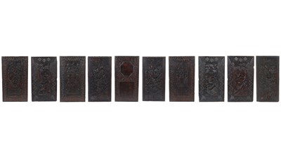 Lot 1368 - A collection of 10 Chinese oriental ebonised hard wood carved panels
