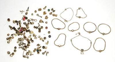 Lot 74 - A collection of Pandora and other charm bracelets and charms.
