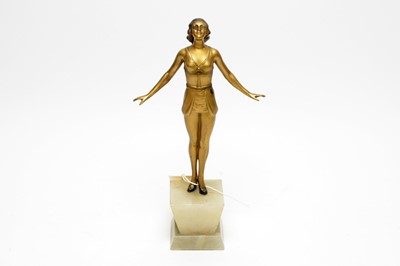 Lot 202 - An Art Deco bronzed spelter figure of a lady