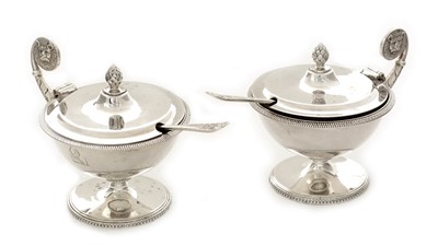 Lot 194 - A pair of George V mustard pots and matching spoons