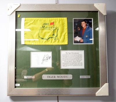 Lot 235 - A Tiger Woods signed photograph montage.