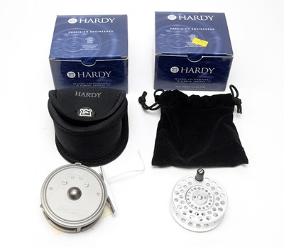 Lot 369 - A Hardy ‘The Featherweight’ fishing reel; and another