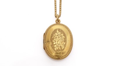 Lot 690 - A Victorian gold locket on chain