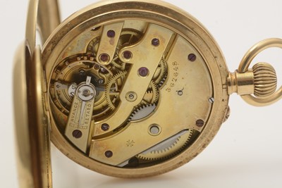 Lot 517 - Goldsmiths & Silversmiths Co Ltd (retailers): an 18ct yellow gold cased half-hunter pocket watch