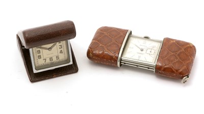 Lot 514 - A bag watch by Movado and another