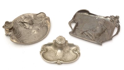 Lot 745 - An Art Nouveau pewter card tray and two ink wells
