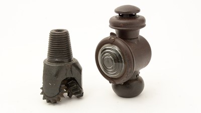 Lot 714 - An oil drilling tricone drill bit, and a lamp