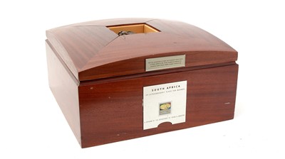 Lot 756 - Donald Greig: a patinated bronze bust of a cheetah, set in a mahogany box