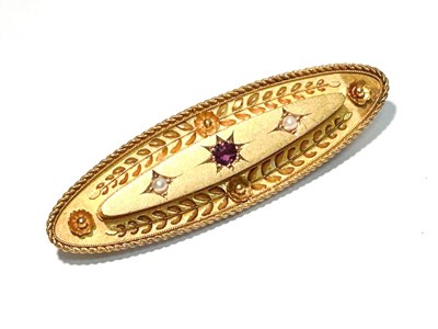 Lot 120 - A Victorian 15ct yellow gold, ruby and seed pearl brooch