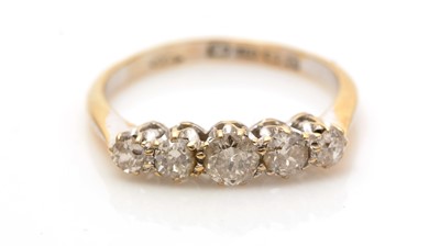Lot 640 - A five stone diamond ring
