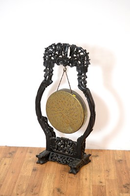 Lot 44 - A Chinese Oriental hardwood and brass gong