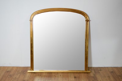 Lot 83 - A reproduction gilt overmantel mirror