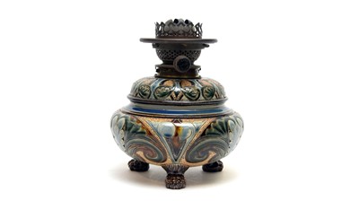 Lot 902 - A Doulton Lambeth oil lamp by Edith Lupton