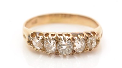 Lot 684 - A five stone diamond ring