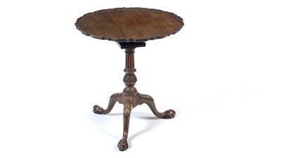 Lot 1490 - A George III style well-carved mahogany tilt-action table