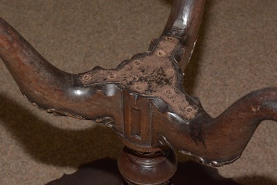Lot 1490 - A George III style well-carved mahogany tilt-action table