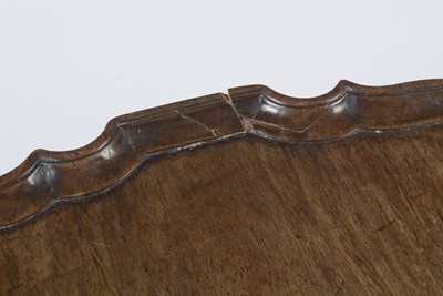 Lot 1490 - A George III style well-carved mahogany tilt-action table