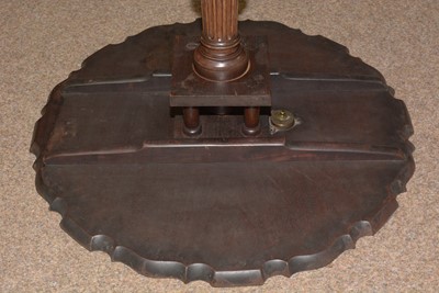 Lot 1490 - A George III style well-carved mahogany tilt-action table