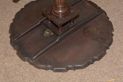 Lot 1490 - A George III style well-carved mahogany tilt-action table