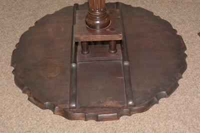 Lot 1490 - A George III style well-carved mahogany tilt-action table