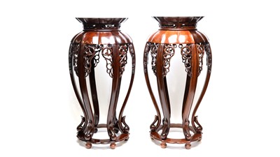 Lot 853 - Pair of Chinese hardwood stands.