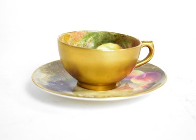 Lot 385 - A Royal Worcester miniature cup and saucer