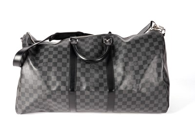 Lot 992 - A Louis Vuitton Damier Keepall in black and graphite