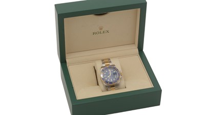 Lot 588 - Rolex Oyster Perpetual Date Submariner: a steel and gold cased automatic wristwatch