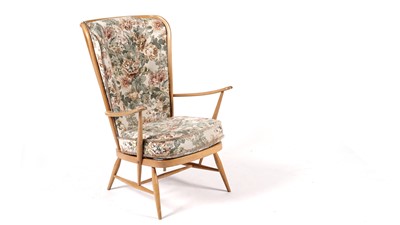 Lot 7 - Lucien Ercolani for Ercol - Model 913: A retro beech and elm highback easychair