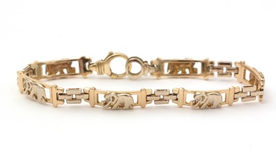 Lot 115 - A diamond and yellow gold elephant bracelet