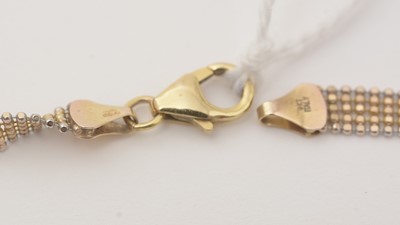 Lot 114 - An Italian bi-colour fancy link gold necklace