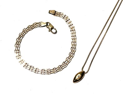Lot 159 - A diamond and gold pendant