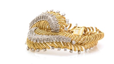 Lot 808 - A fine gold and diamond bracelet