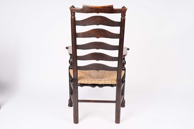 Lot 740 - A harlequin set of eight 19th Century Billinge ash ladderback chairs