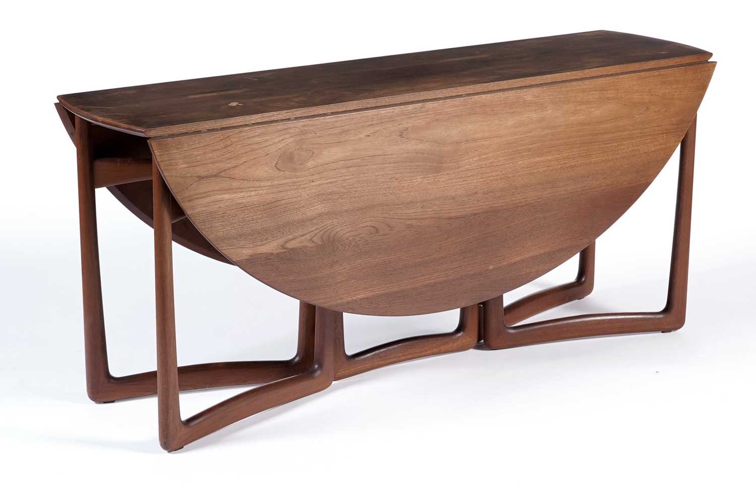 Lot 2 - Peter Hvidt & Orla Mølgaard-Neilson for France & Son: a teak double gateleg drop leaf table