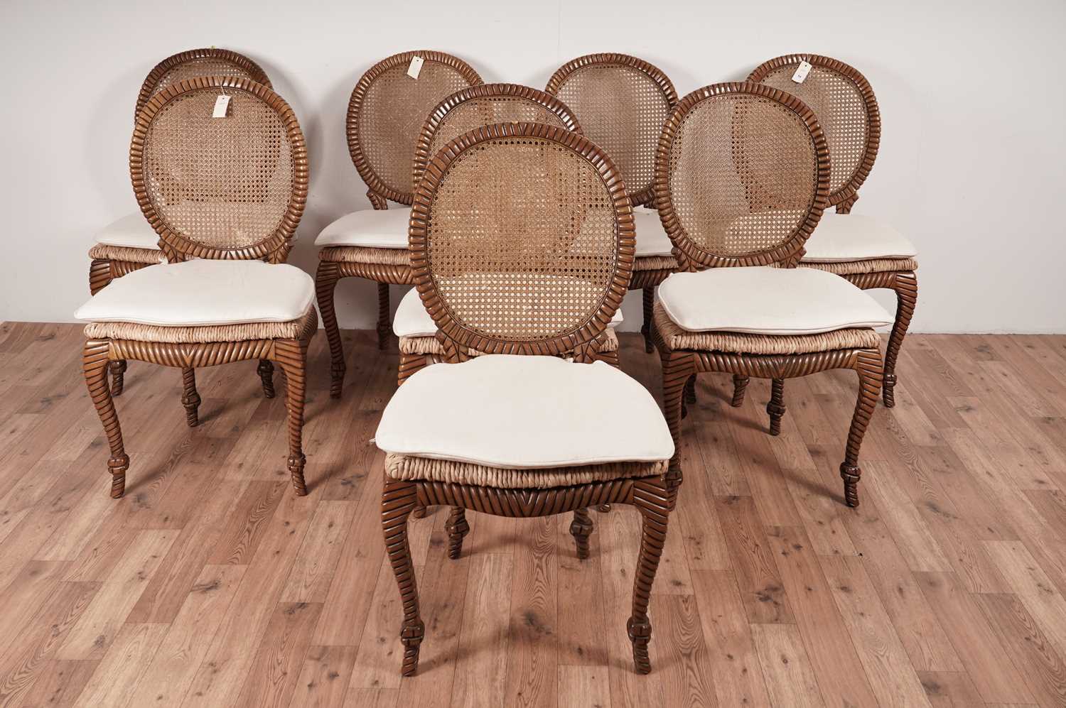 Lot 54 - A set of eight stylish modern hardwood 'faux rope' dining chairs