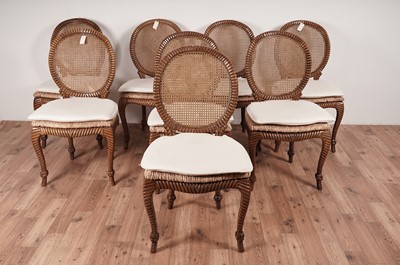 Lot 54 - A set of eight stylish modern hardwood 'faux rope' dining chairs