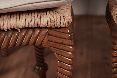 Lot 54 - A set of eight stylish modern hardwood 'faux rope' dining chairs