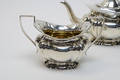 Lot 222 - An Edwardian silver three-piece tea service