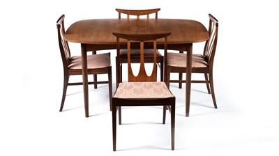 Lot 62 - E Gomme for G Plan: A retro teak extending dining table and four chairs