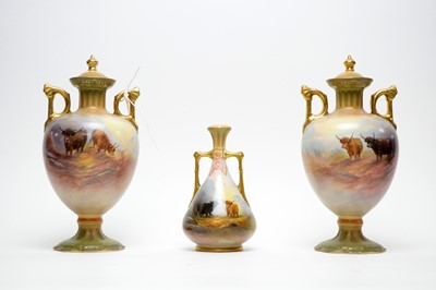 Lot 162 - A pair of Crown Devon Fieldings twin handled urn vases and covers