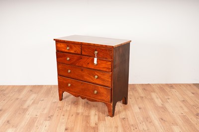 Lot 6 - A Georgian line inlaid mahogany chest of drawers