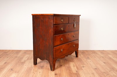 Lot 6 - A Georgian line inlaid mahogany chest of drawers