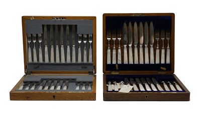 Lot 110 - An early 20th Century walnut canteen of cutlery