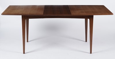 Lot 20 - A retro teak extending dining table and six chairs